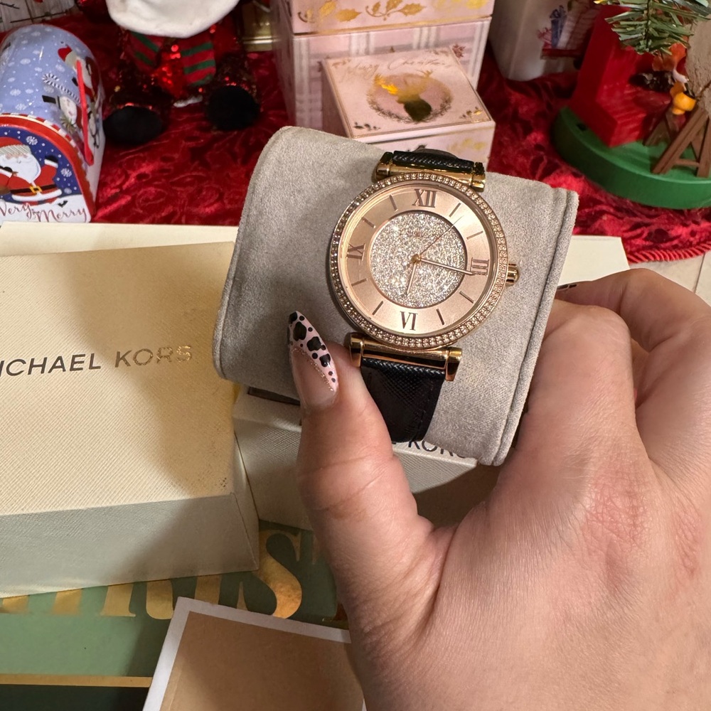 Black and gold Michael Kors watch